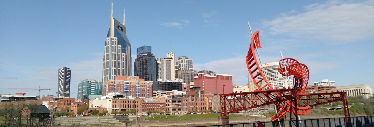 Downtown Nashville with Ghost Dancing sculpture in foreground